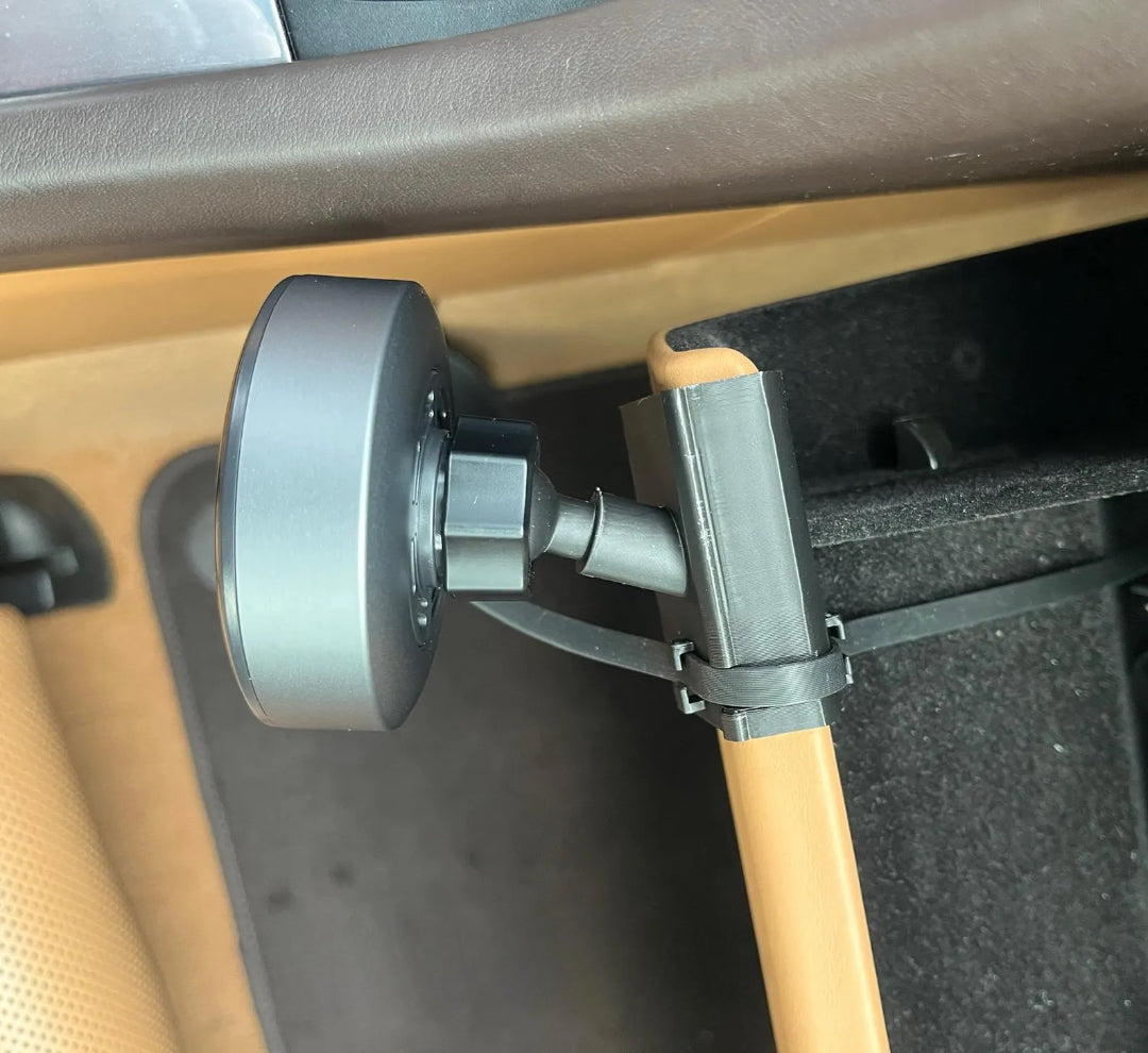 Phone mount mounted on glove box